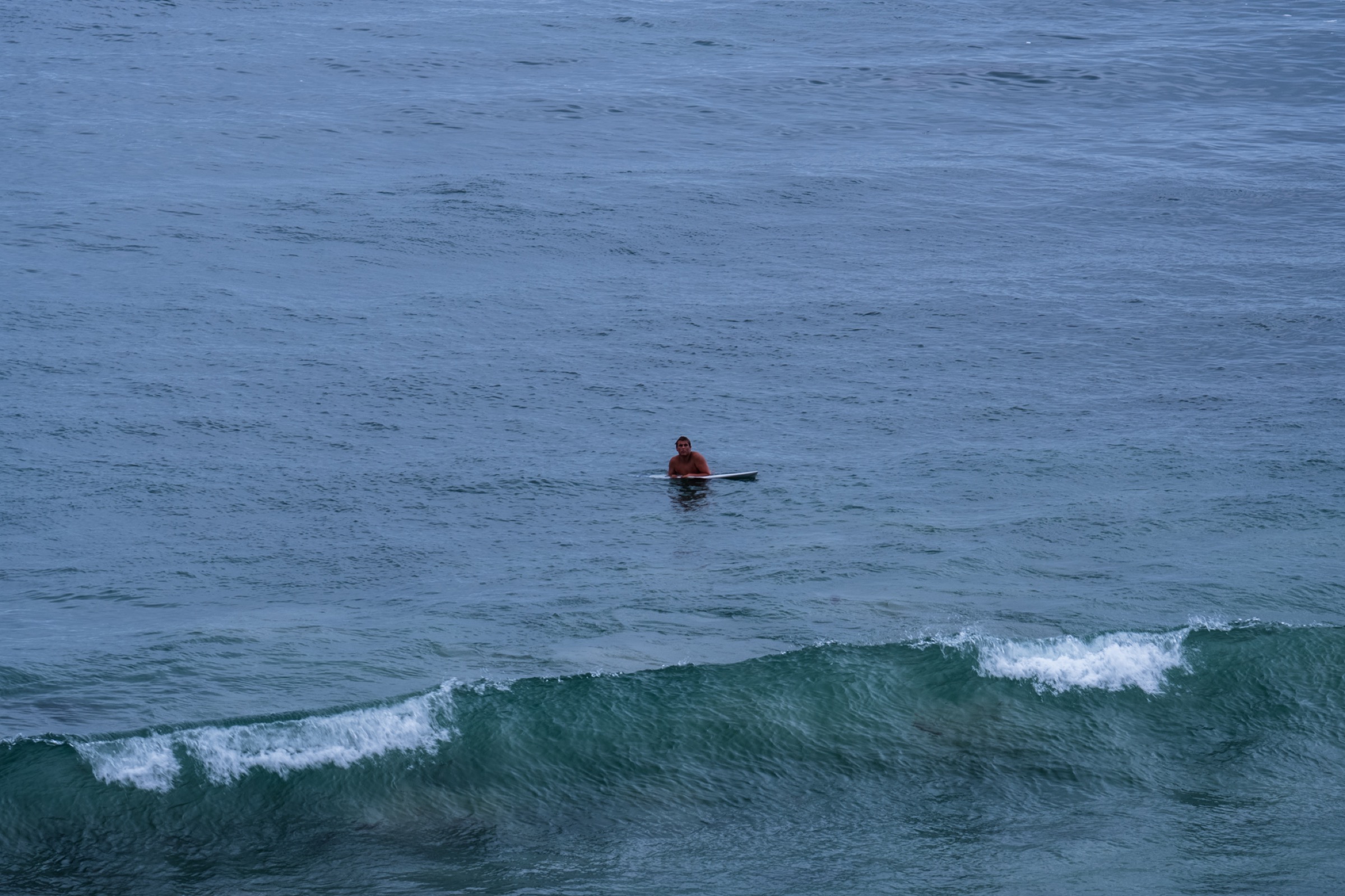surfer waiting in the lineup